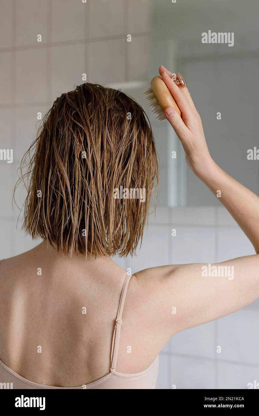 Woman makes a head self massage for hair growth Stock Photo - Alamy Woman makes a head self massage for hair growth Stock Photo - Alamy