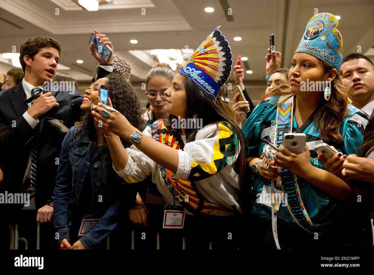 Shasta Dazen, 21, center, of Whiteriver, Ariz., who is the 53rd Miss
