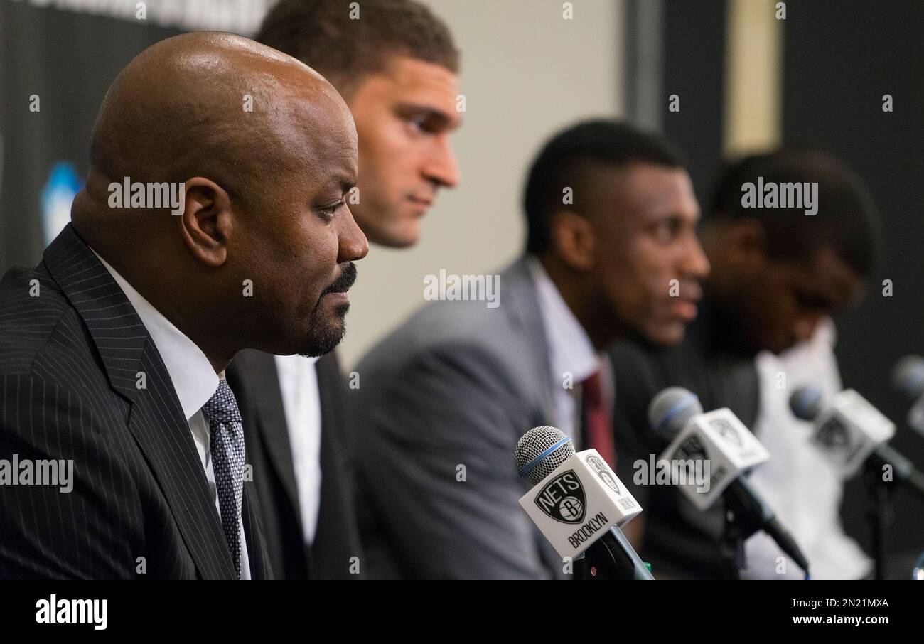 Brooklyn Nets General Manager Billy King, left, comments during a news