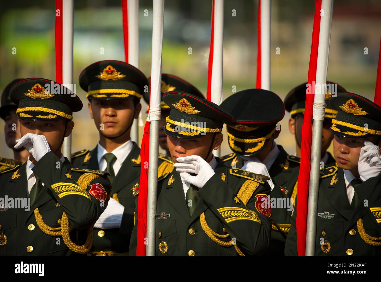 Members of the Chinese People's Liberation Army (PLA) honor guard wipe ...