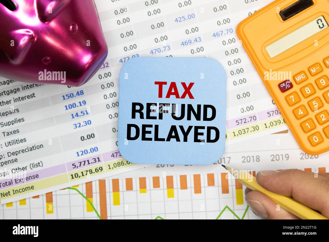 Sticky note with the text Tax Refund Delayed on Tax form