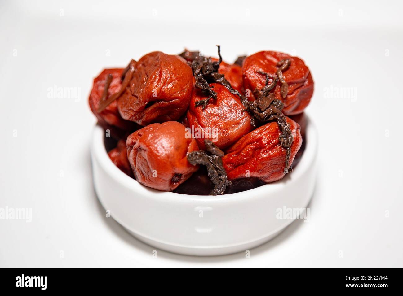 Japanese umeboshi, traditional kind of fermented salted plum with red