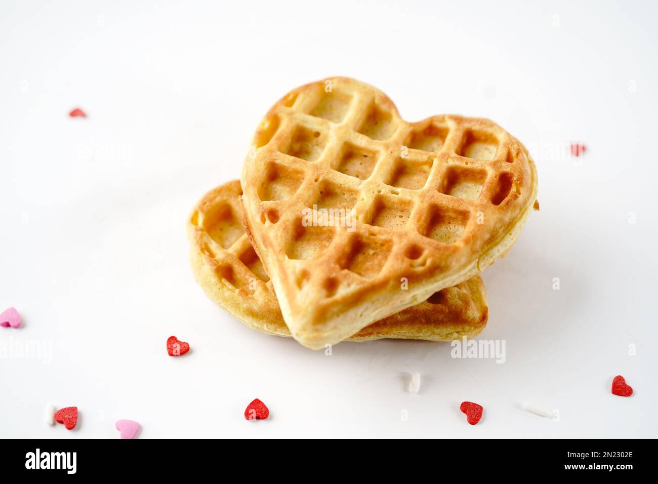Homemade heart shaped waffles isolated on white background Valentine
