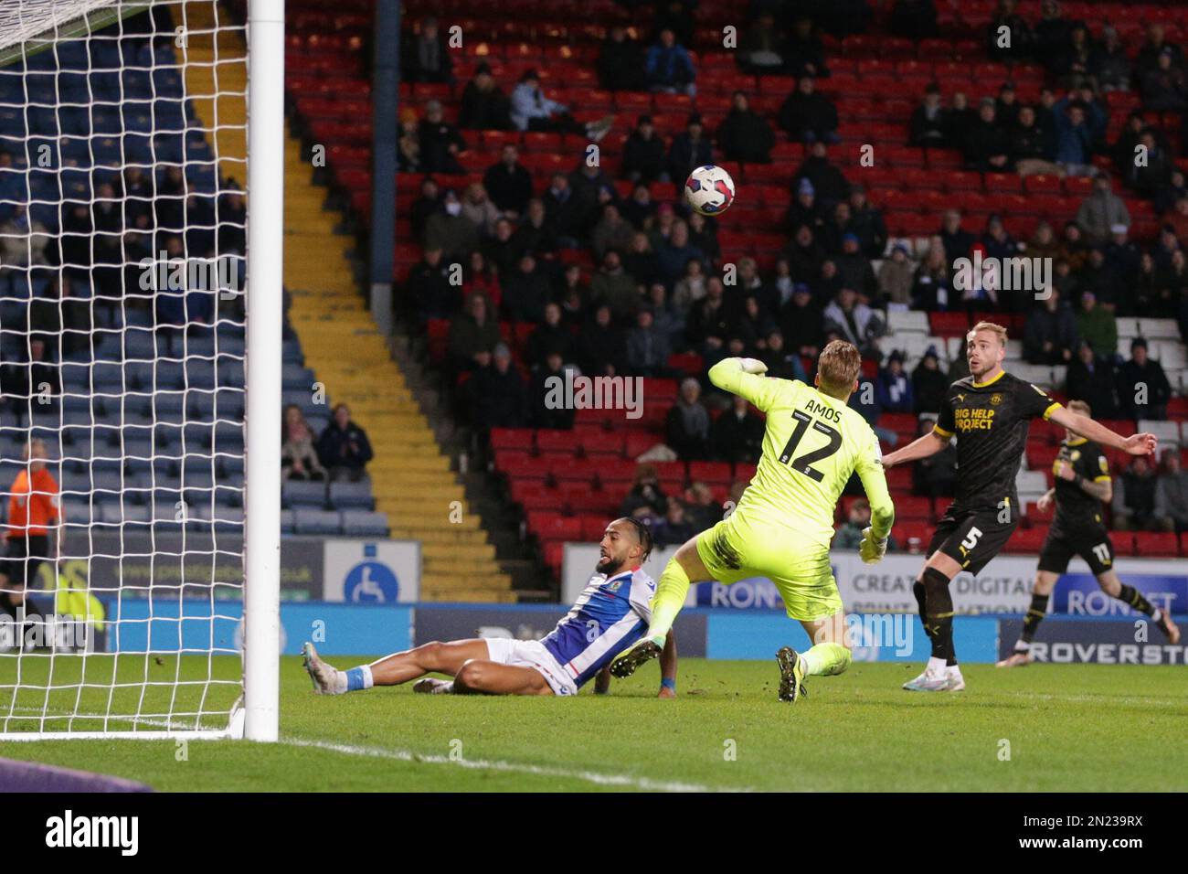 Ben Amos of Wigan Athletic makes a save from Sorba Thomas #14 of Blackburn Rovers during the Sky Bet Championship match Blackburn Rovers vs Wigan Athletic at Ewood Park, Blackburn, United Kingdom, 6th February 2023  (Photo by Phil Bryan/News Images) Stock Photo