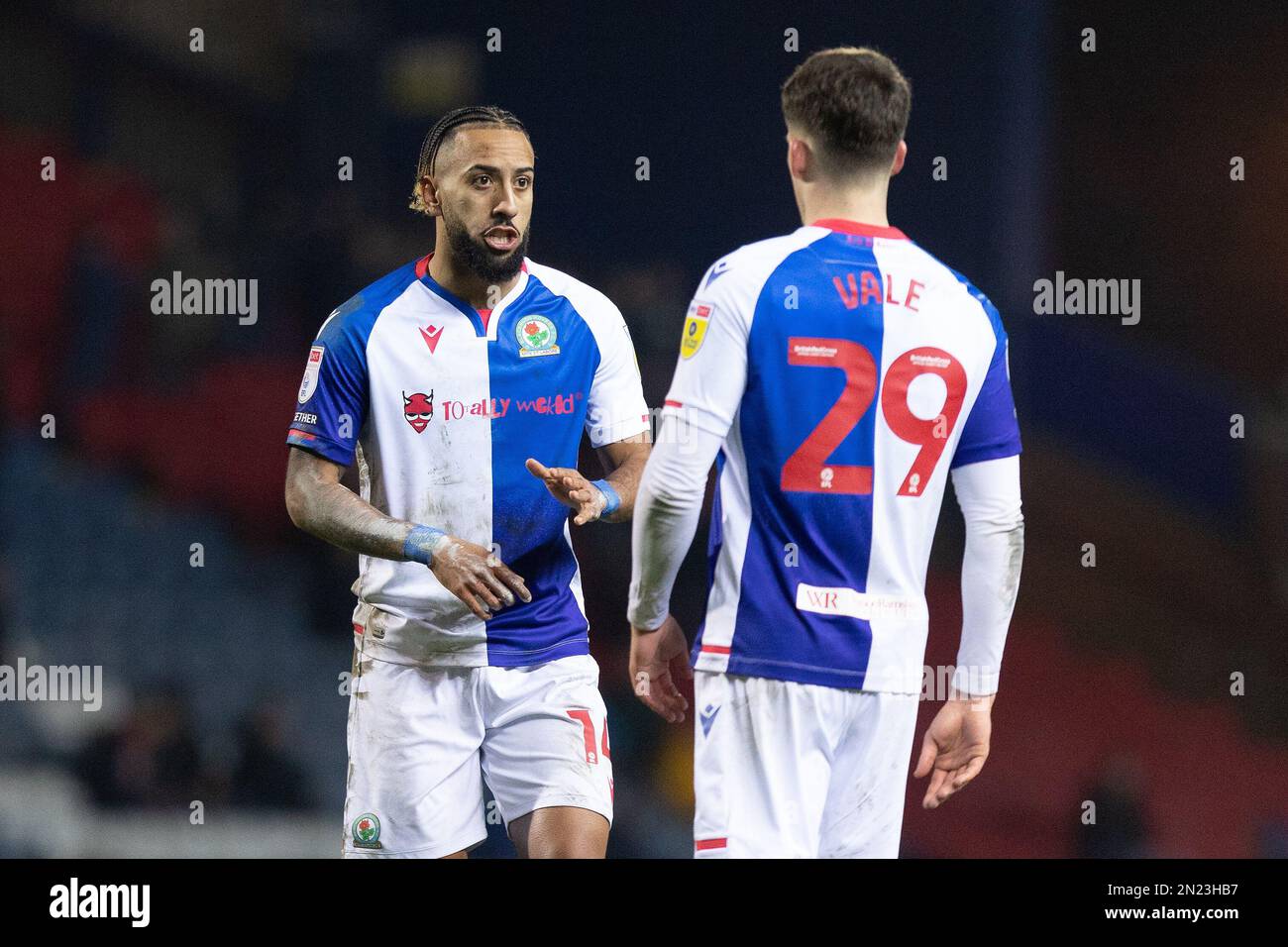 Sorba Thomas #14 of Blackburn Rovers talks with team mate Jack Vale #29 of Blackburn Rovers during the Sky Bet Championship match Blackburn Rovers vs Wigan Athletic at Ewood Park, Blackburn, United Kingdom, 6th February 2023  (Photo by Phil Bryan/News Images) Stock Photo