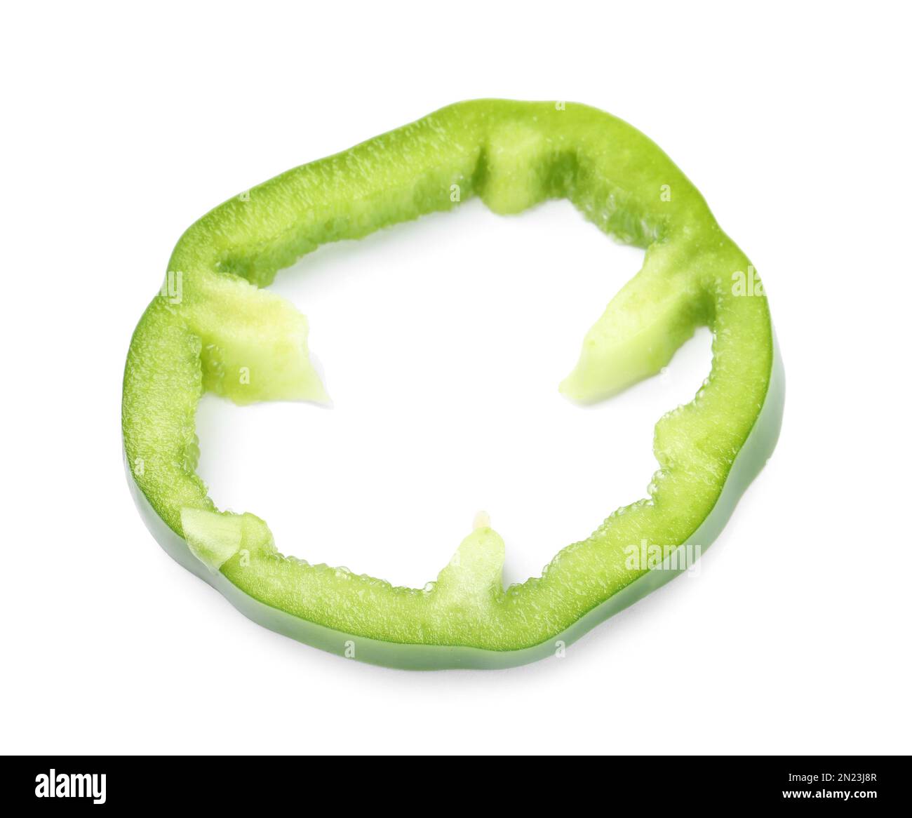 Slice of green bell pepper isolated on white Stock Photo - Alamy