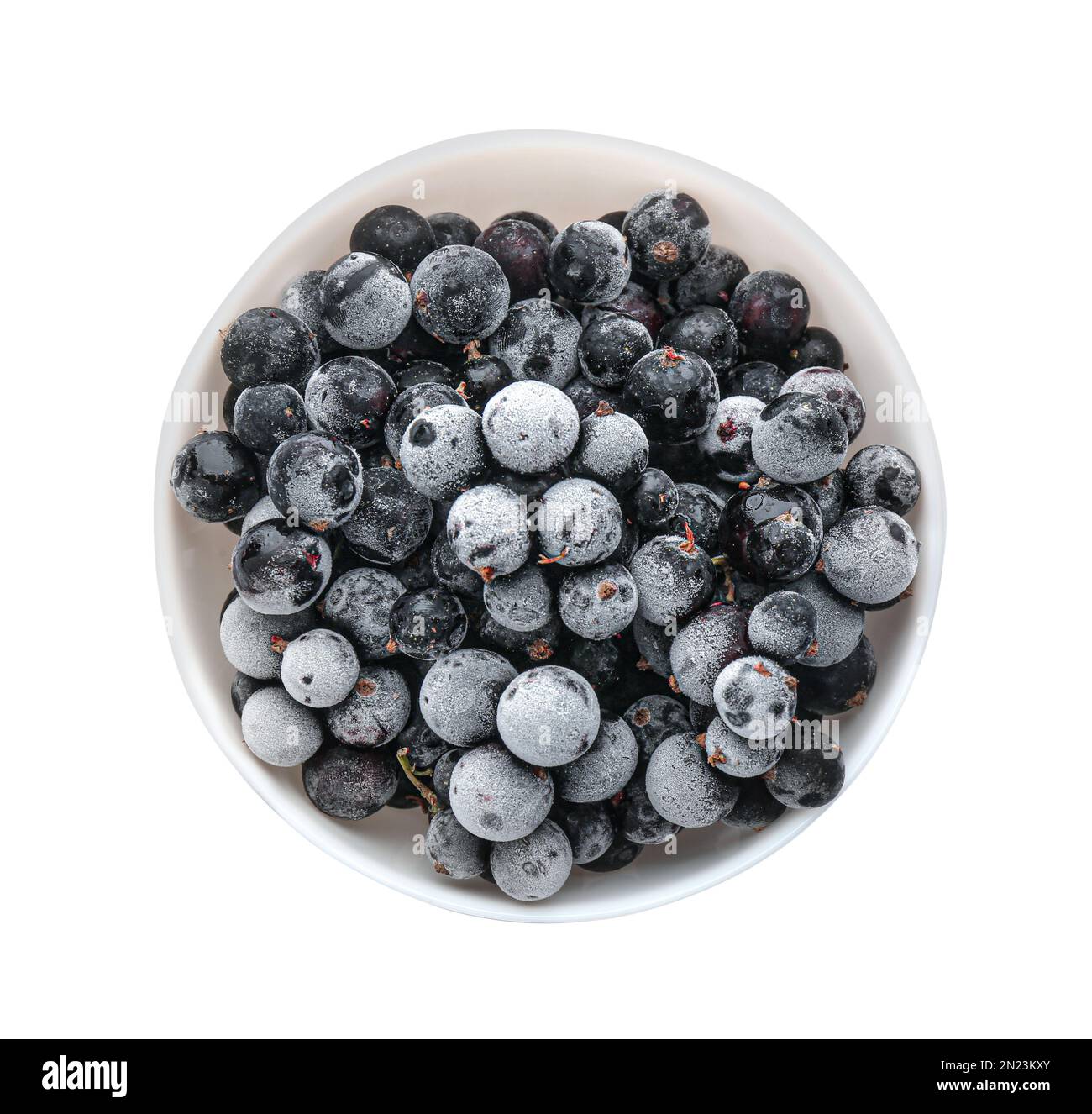 Tasty frozen black currants in bowl isolated on white, top view Stock Photo  - Alamy