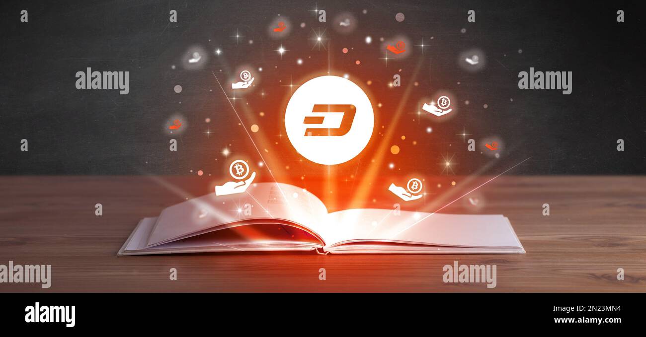 Open book with currency icons above Stock Photo - Alamy