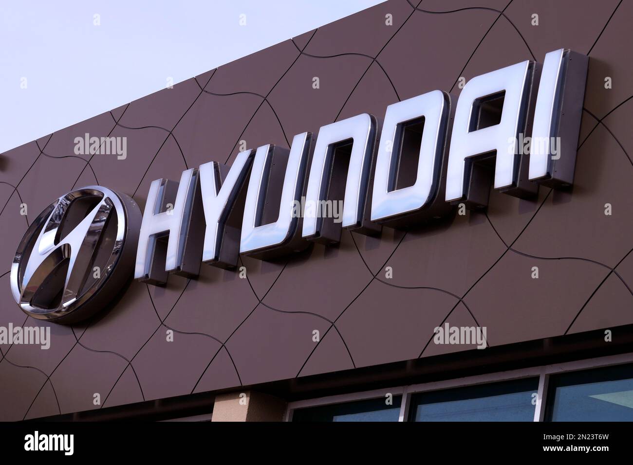 The Hyundai logo is displayed on the facade of a dealership, Monday ...
