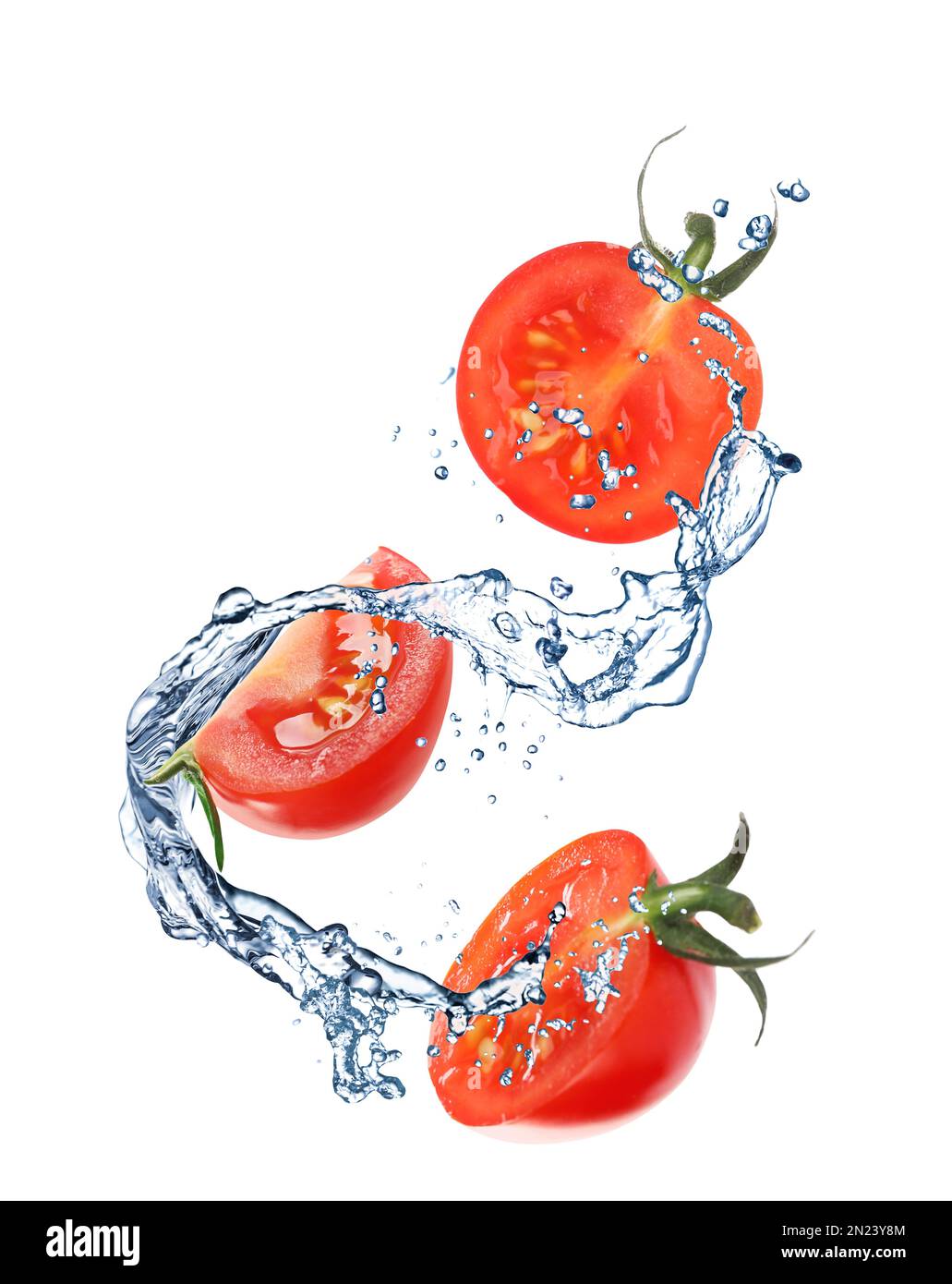Fresh cut tomatoes with water splash on white background Stock Photo ...