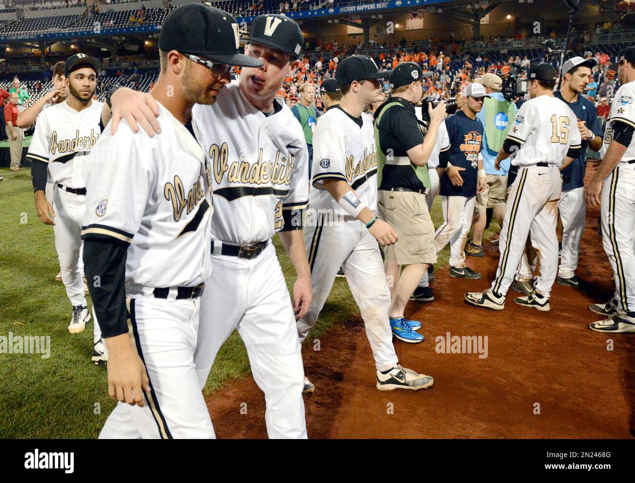 Vanderbilt pitcher Philip Pfeifer, left and pitching coach Scott Brown ...