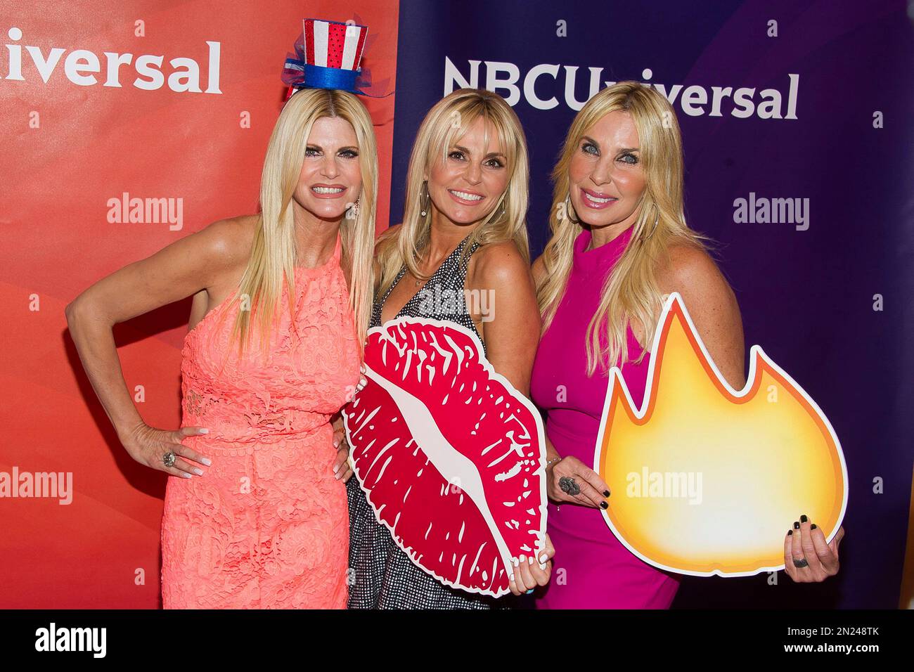 Liza Sandler, from left, Cori Goldfarb and Andi Black arrive at the