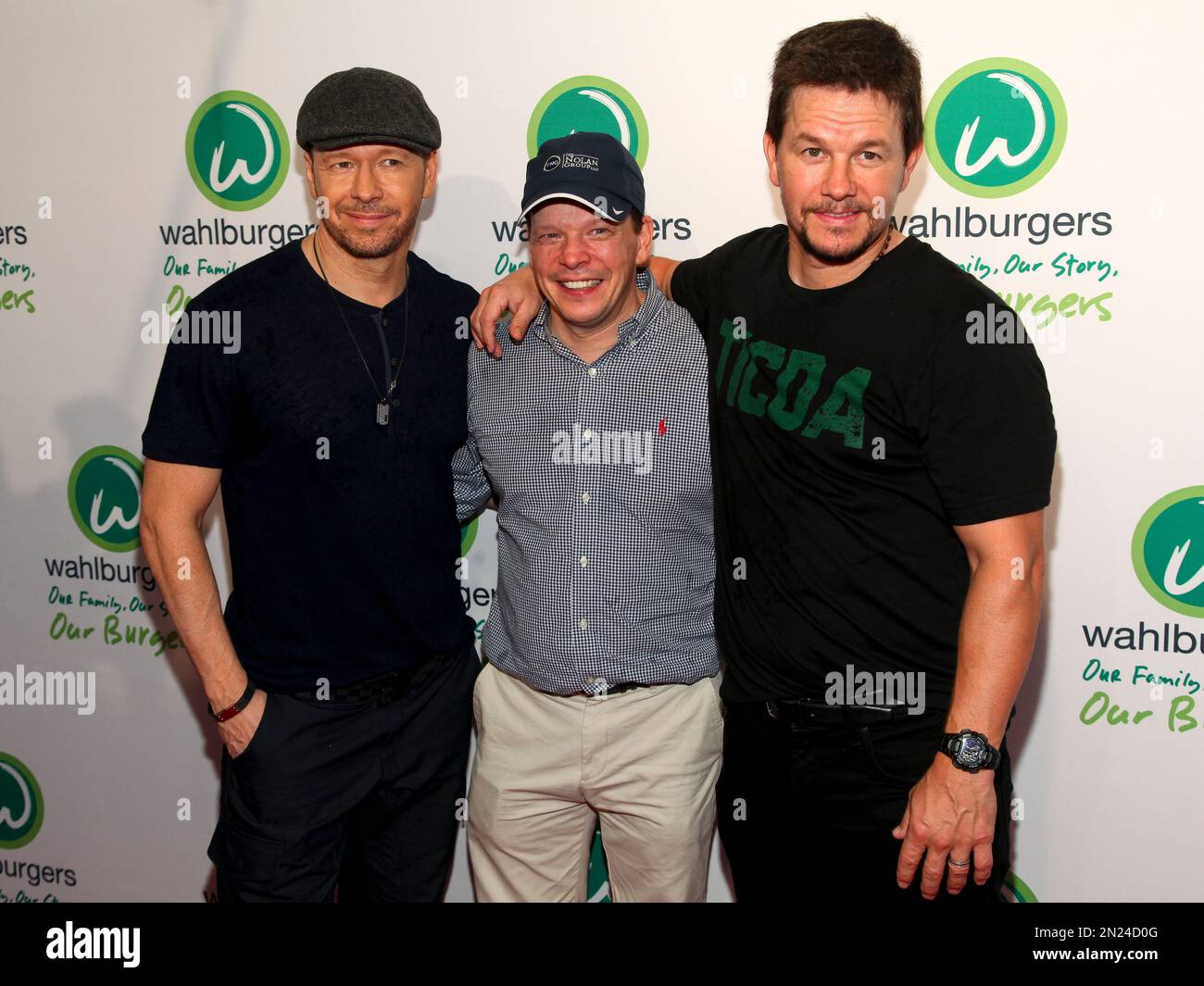 Donnie Wahlberg, from left, Paul Wahlberg and Mark Wahlberg attend the
