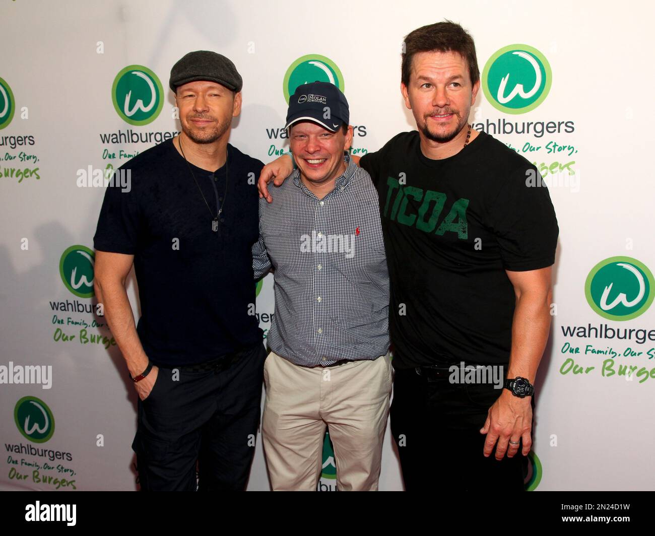 Donnie Wahlberg, from left, Paul Wahlberg and Mark Wahlberg attend the ...