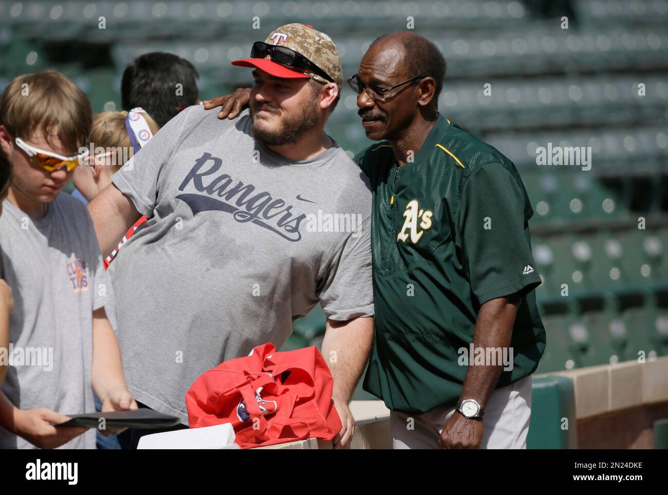 Oakland Athletics fielding coach Ron Washington poses for photo with a