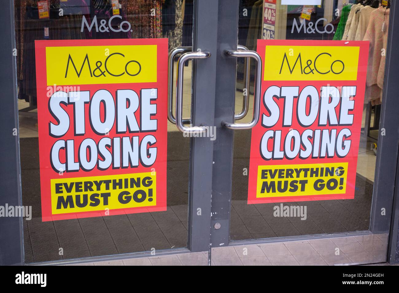 The closing down sale at the M&Co / M & Co shop in Wokingham, Berkshire Stock Photo