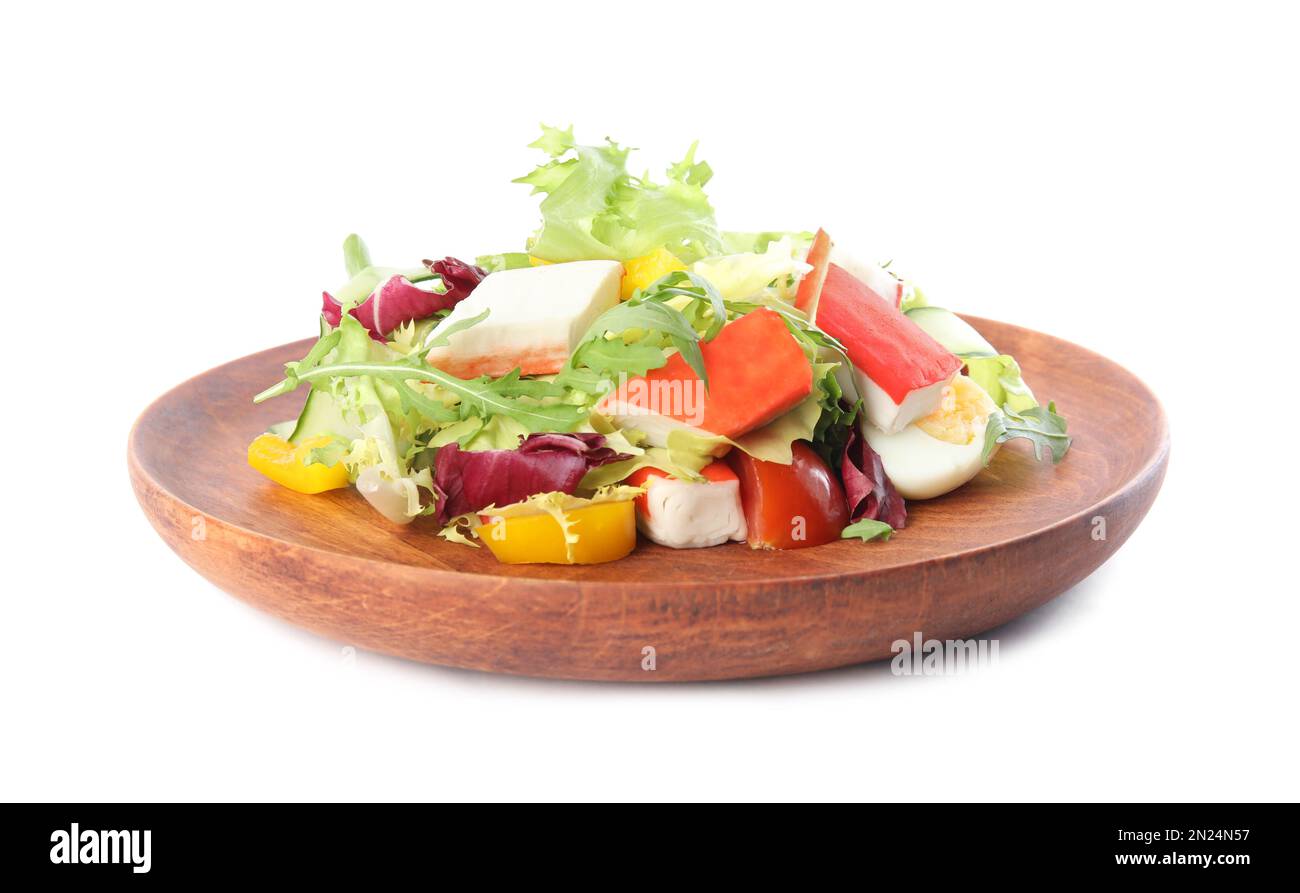 Delicious salad with crab sticks and lettuce on white background Stock