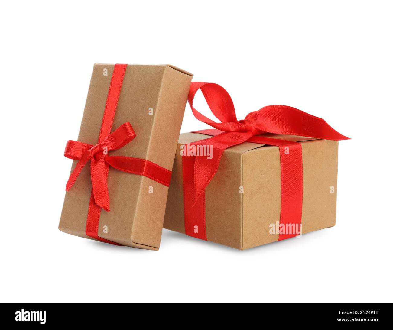 Christmas gift boxes decorated with red bows on white background Stock ...