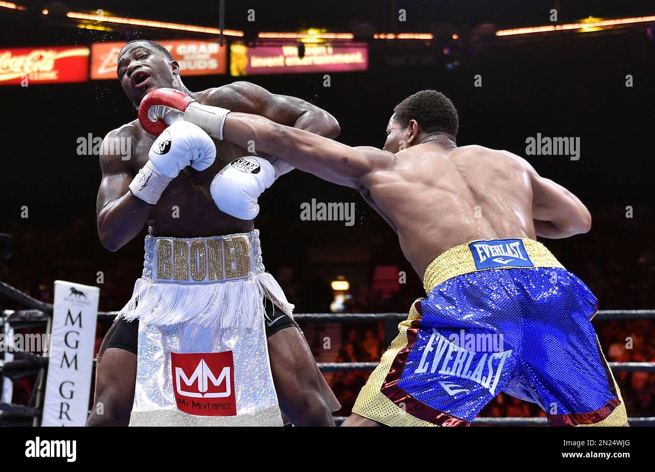 Adrien Broner, left, and Shawn Porter battle during a welterweight