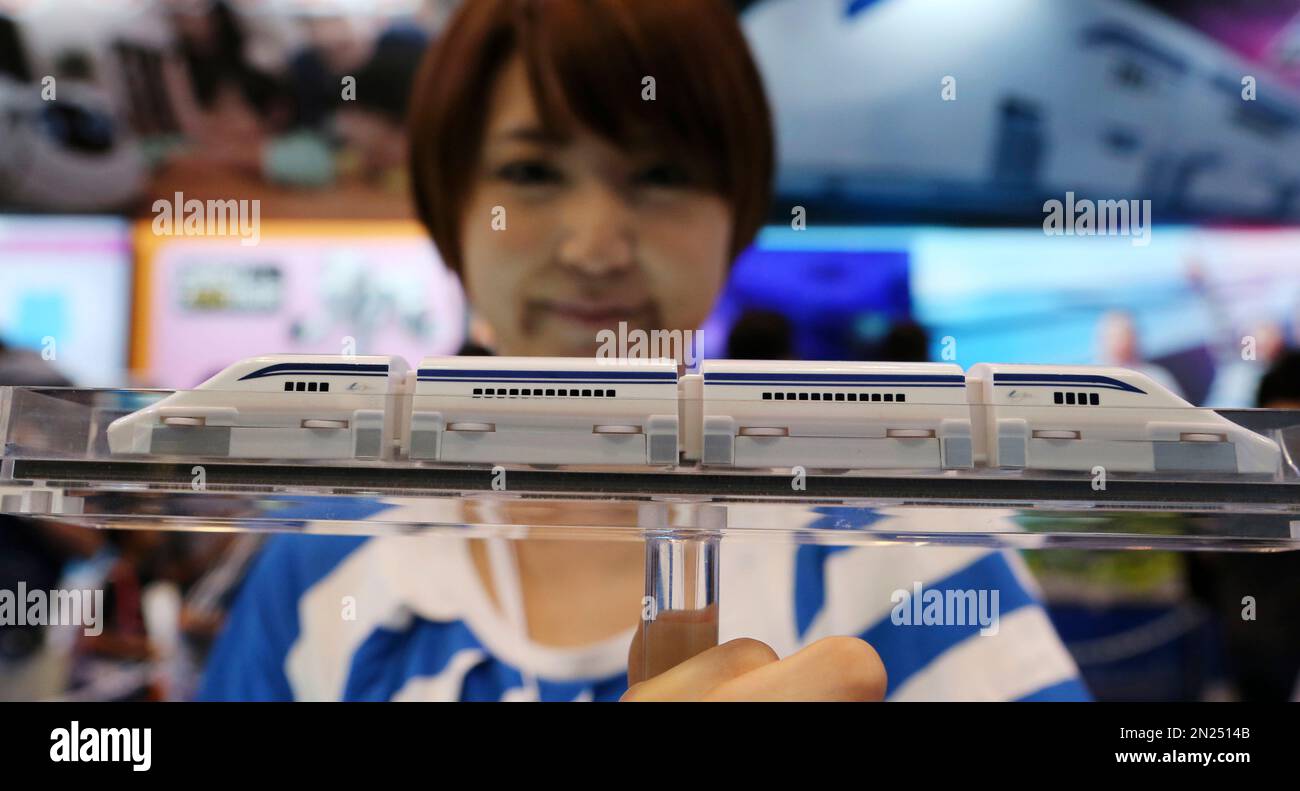 Takara Tomy's Linear Liner is exhibited at the booth of the Japanese