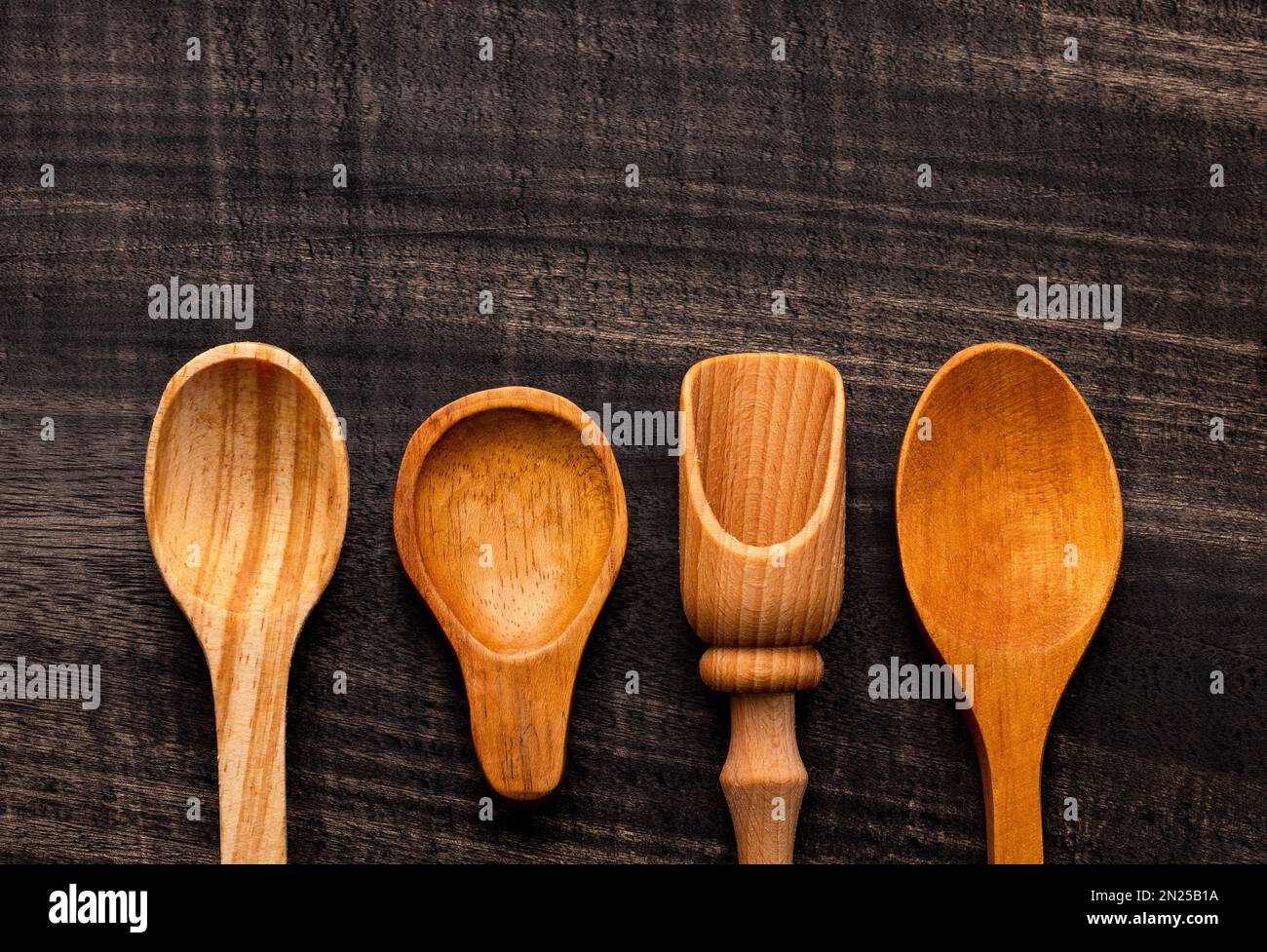 Different types of wooden spoon, kitchen utensil on white background ...