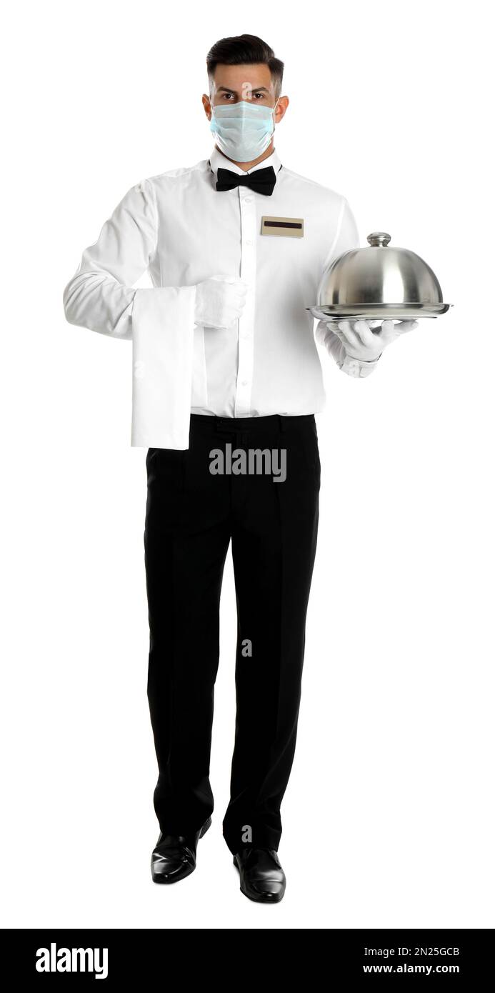 Waiter in medical face mask holding tray with lid on white background ...