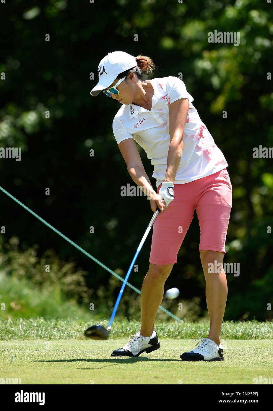 Jennifer Song hits from the thirteenth tee during the final round of