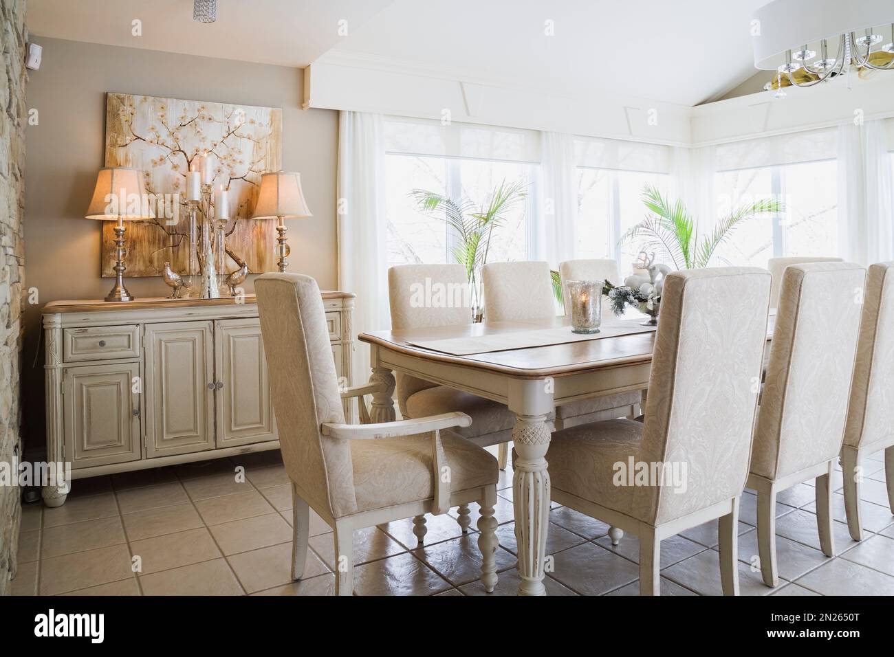 Exotic wood buffet and dining table with upholstered high back chairs