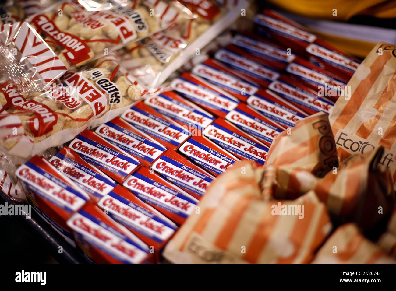 A PNC Park vendor's tray is stocked with peanuts, popcorn and Cracker