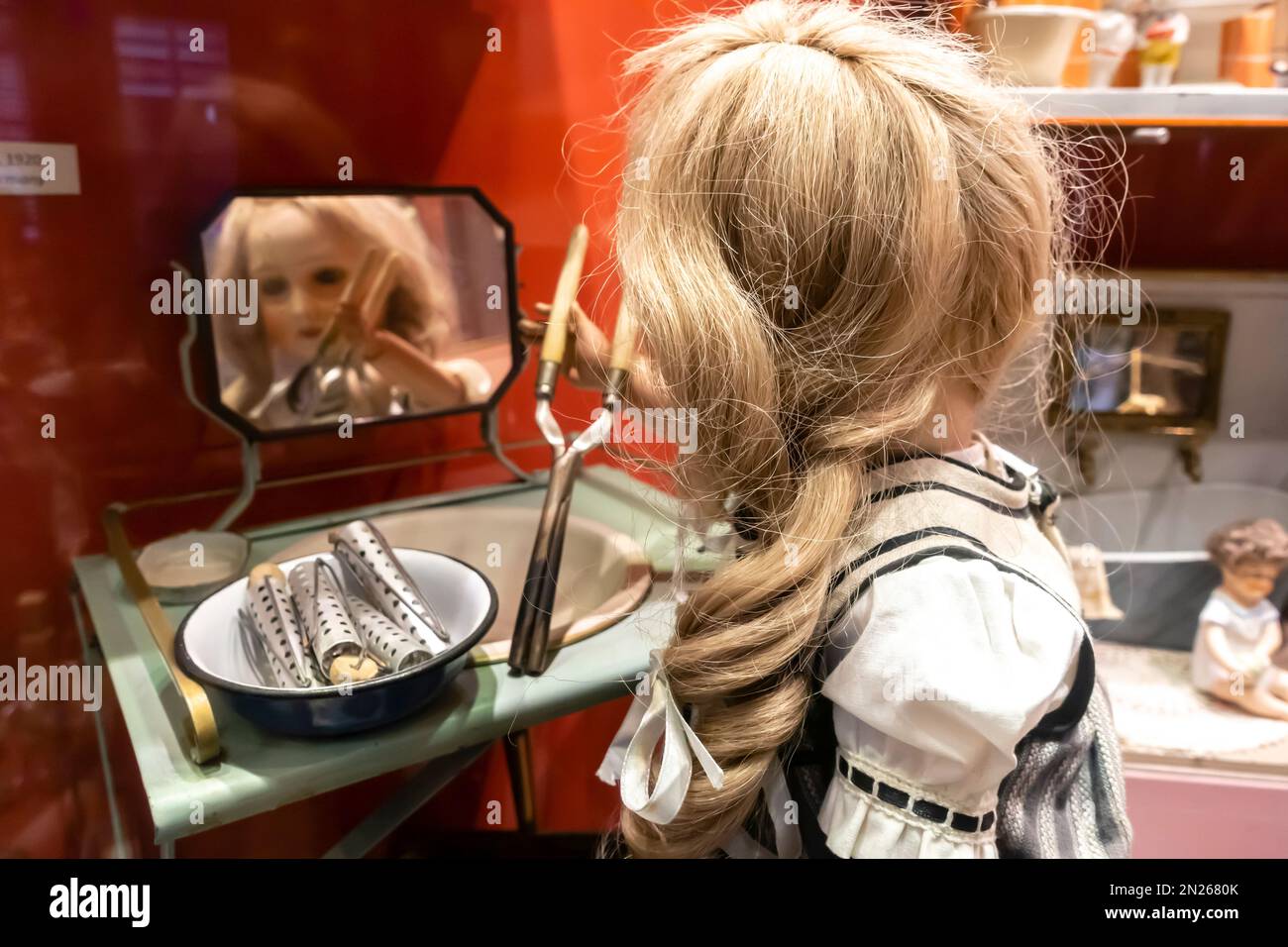 Vintage German toys. Girl in the bathroom toy macquet. 1920s Stock