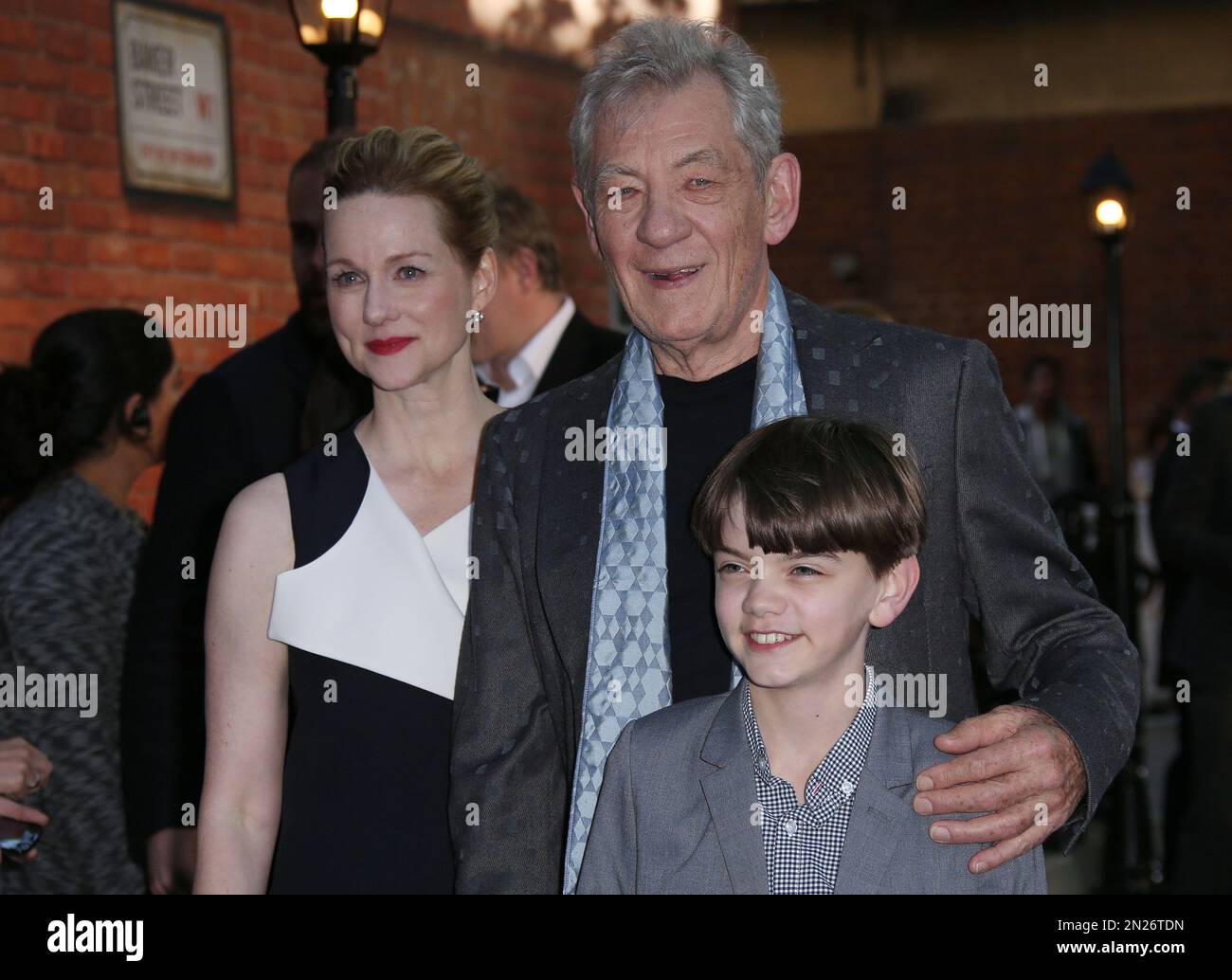 Milo Linney Sir Ian McKellen, Laura Linney and Milo Parker pose for photographers ...