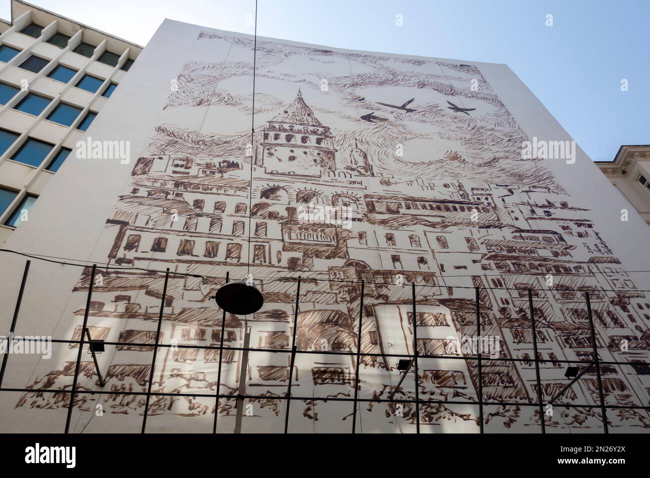Facade mural artwork depicting historic Galata tower district on  the building in Karakoy Istanbul Turkey Stock Photo