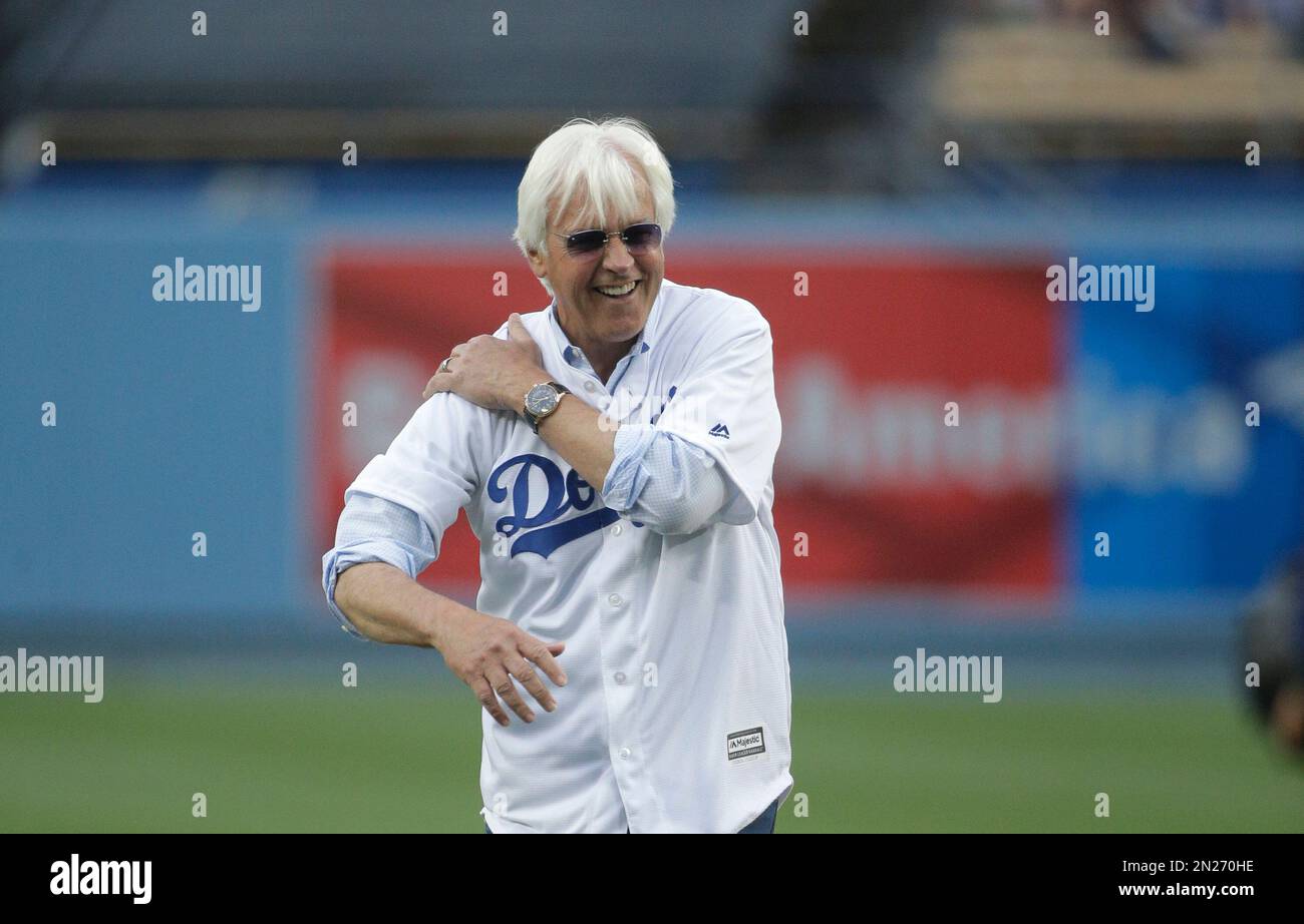 Trainer Bob Baffert rides celebrity wave onto Dodger Stadium mound