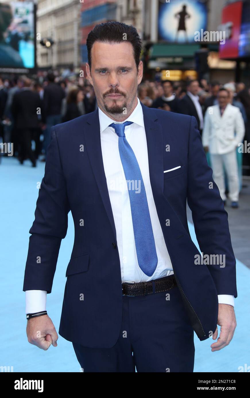 Kevin Dillon poses for photographers upon arrival at the premiere of