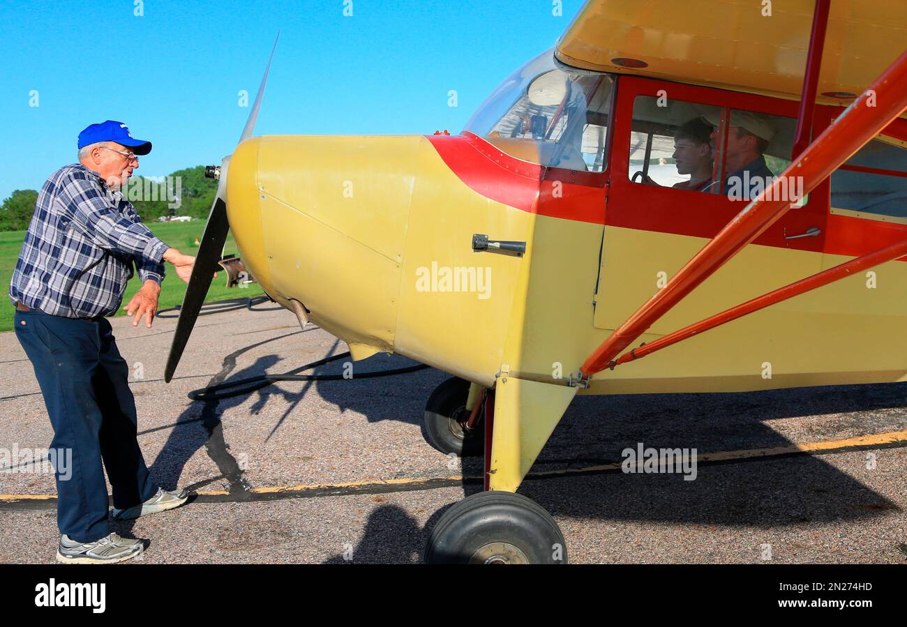 In this June 1, 2015 photo, Gene Martin, owner of Martin Field, left