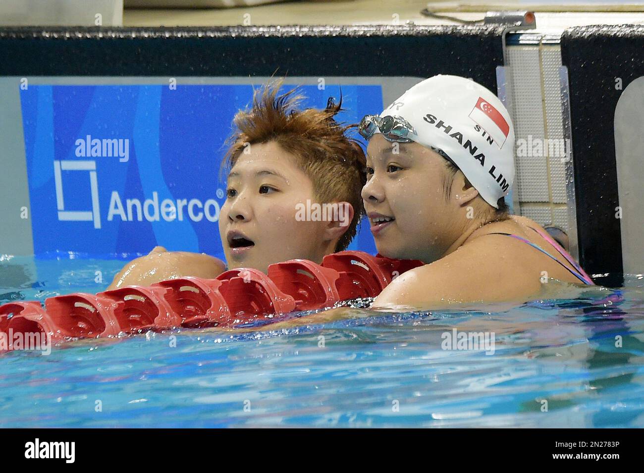 Backstroke Time Singapore's Tao Li, left checked time with her compatriot Shana Lim ...