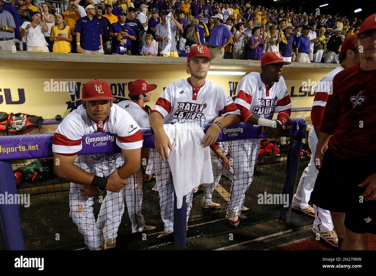 LouisianaLafayette players react in the dugout after losing to LSU in