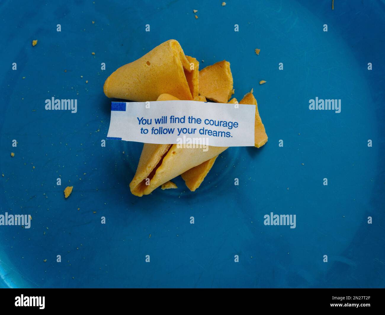 Fortune cookie positing you will find courage Stock Photo