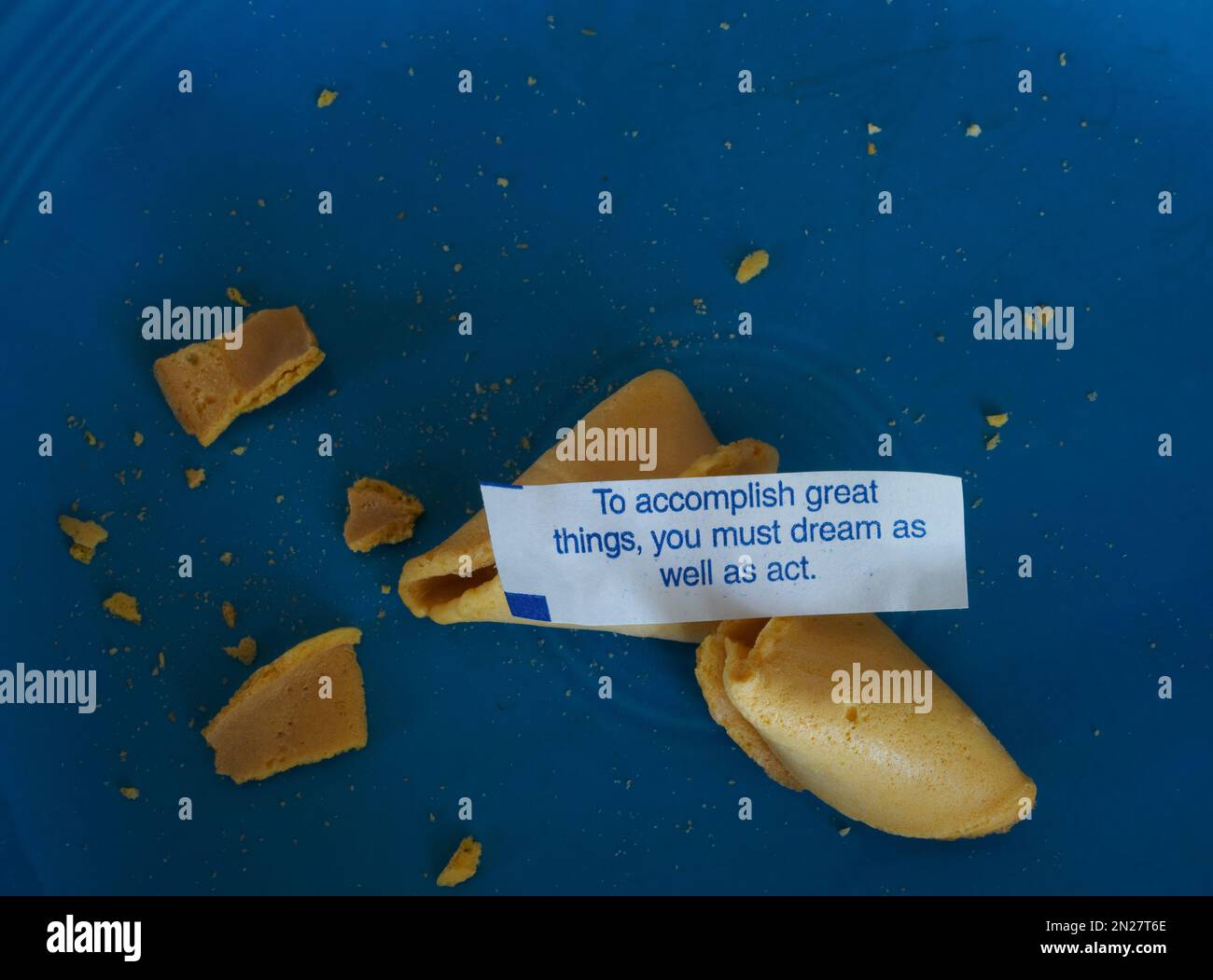 Dream and act to accomplish great things.  Fortune cookie. Stock Photo