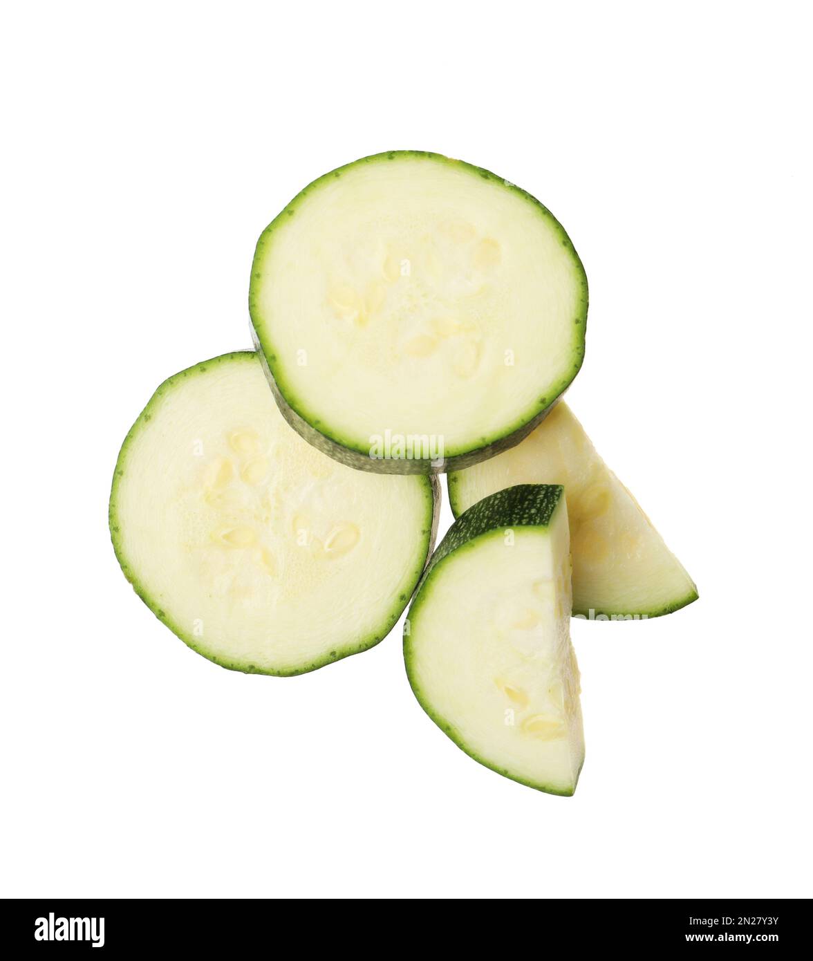 Slices of ripe zucchini on white background, top view Stock Photo