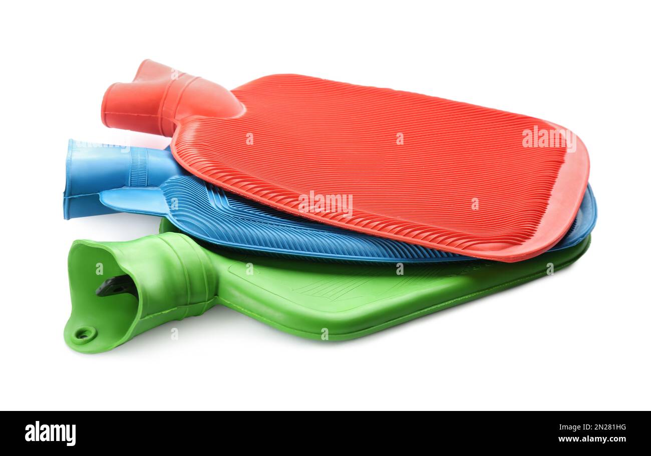 Rubber hot water bottles isolated on white Stock Photo Alamy