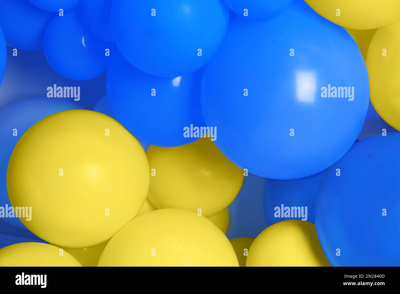Many balloons in colors of Ukrainian flag as background Stock Photo