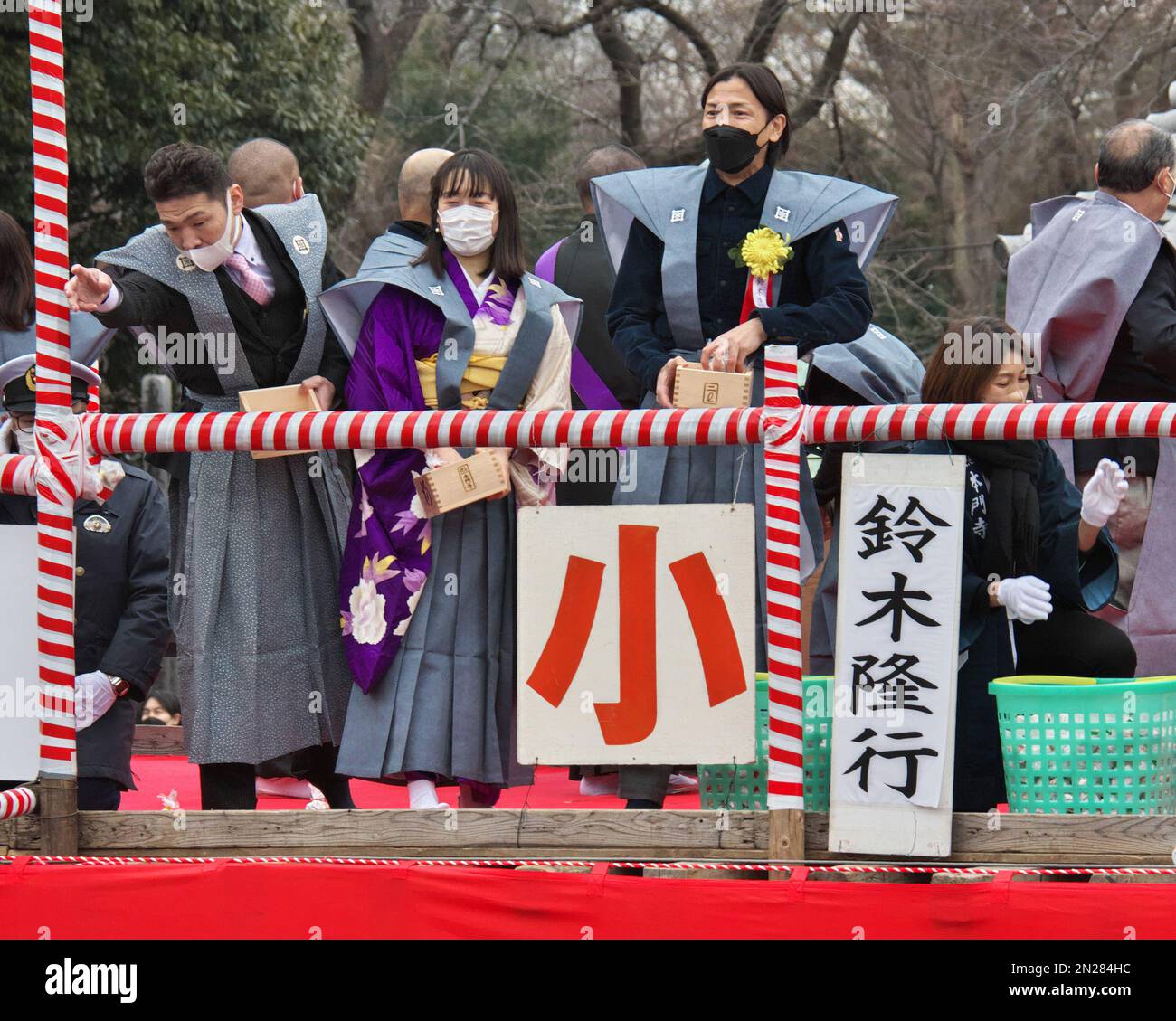 Japanese former professional footballer Takayuki Suzuki(R) attends the 