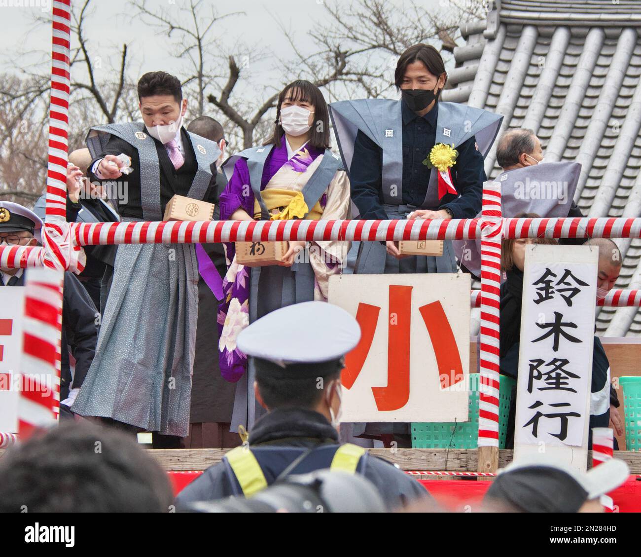 Japanese former professional footballer Takayuki Suzuki(R) attends the 