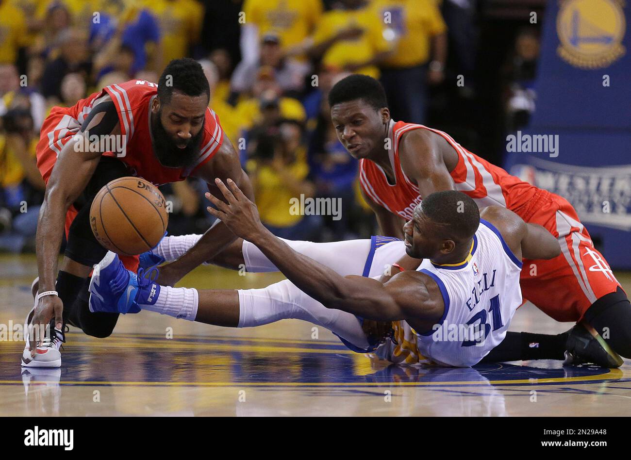 Golden State Warriors center Festus Ezeli (31) reaches for a loose ball ...