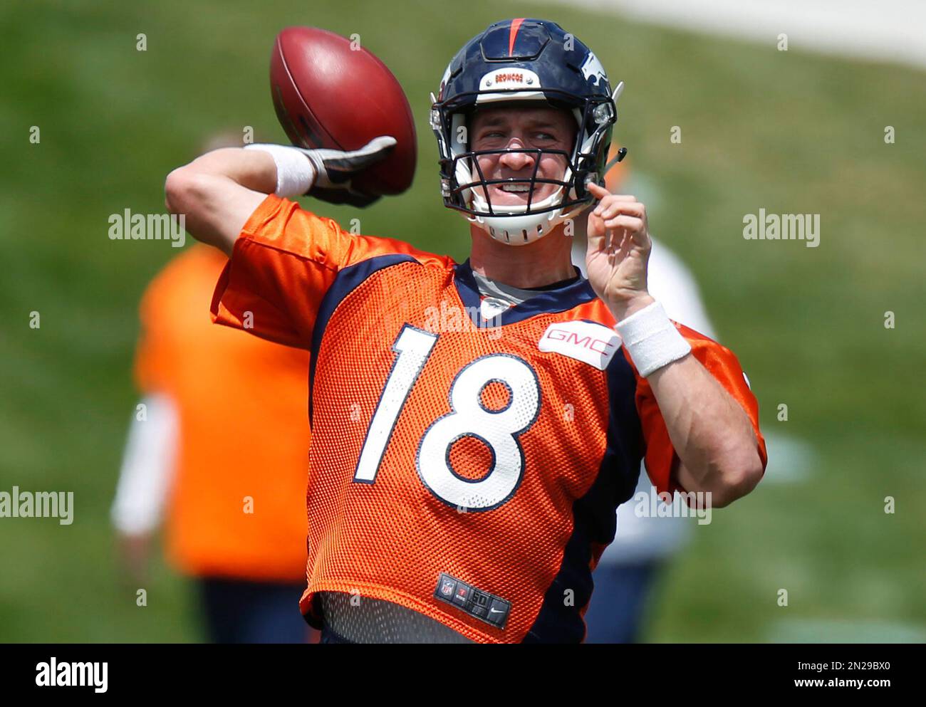 Denver Broncos quarterback Peyton Manning throws a pass during drills ...