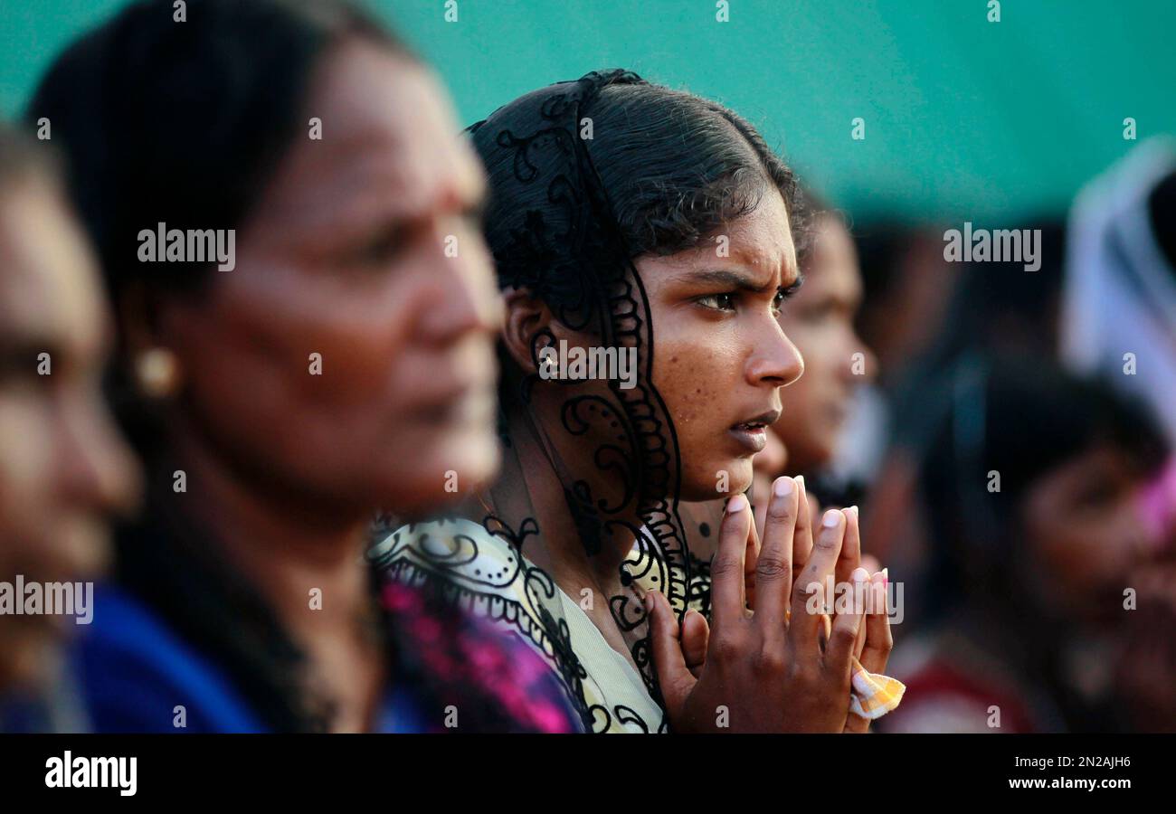 In this Monday, May 18, 2015 photo, Sri Lankan ethnic Tamils pray ...