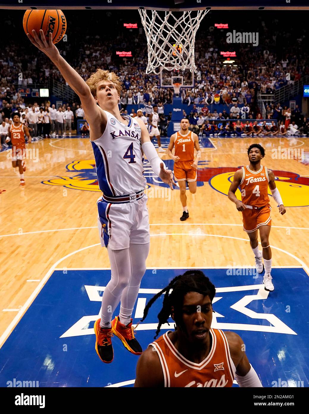 Kansas guard Gradey Dick (4) puts up a shot during the first half of an  NCAA college basketball game against Texas Monday, Feb. 6, 2023, in  Lawrence, Kan. (AP PhotoCharlie Riedel Stock