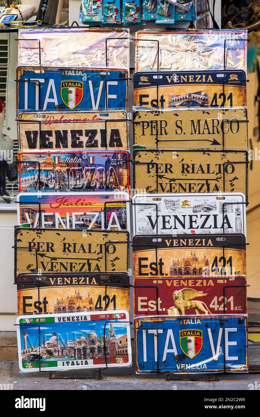 Metal signs with Venetian themes for sale at a market stall, Venice ...