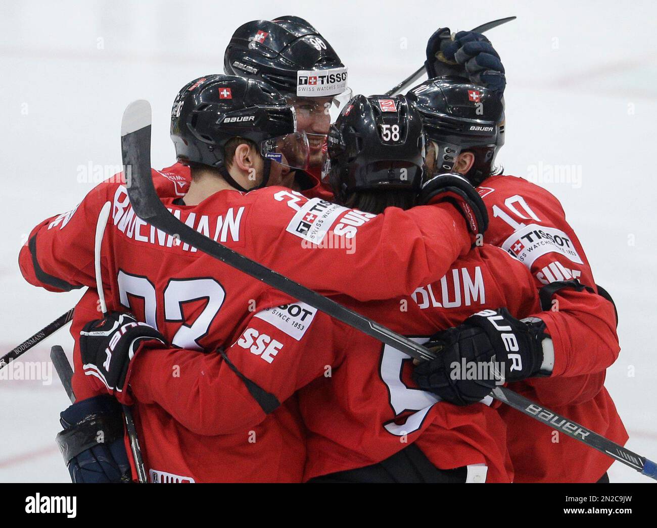 Players of Switzerland celebrate a goa against Sweden during the 